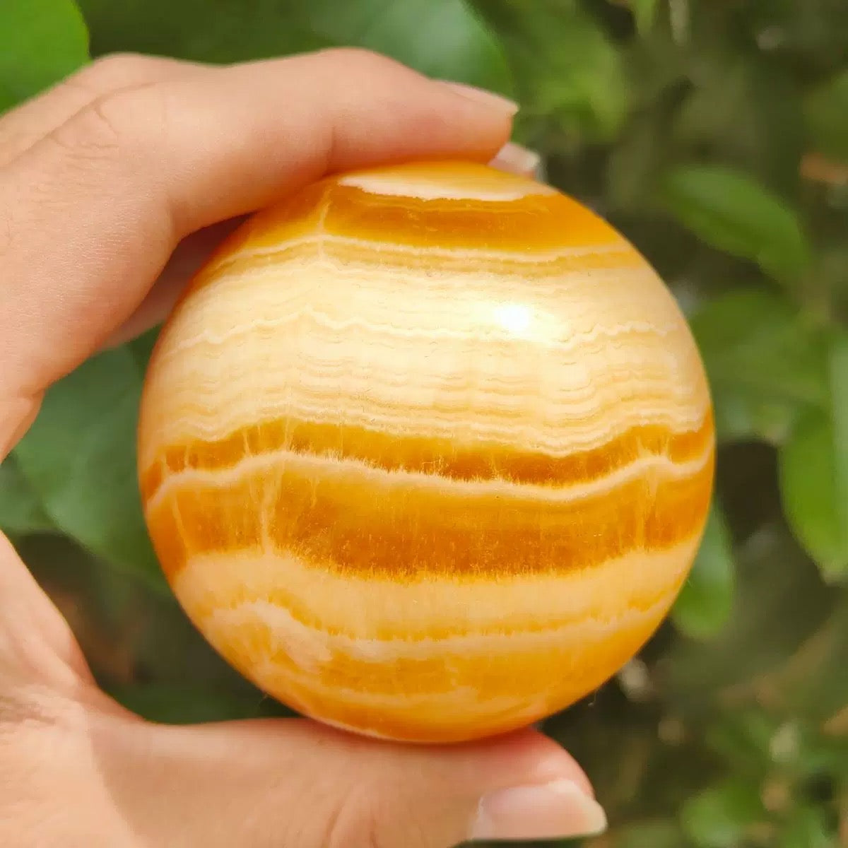 Orange stripe calcite sphere