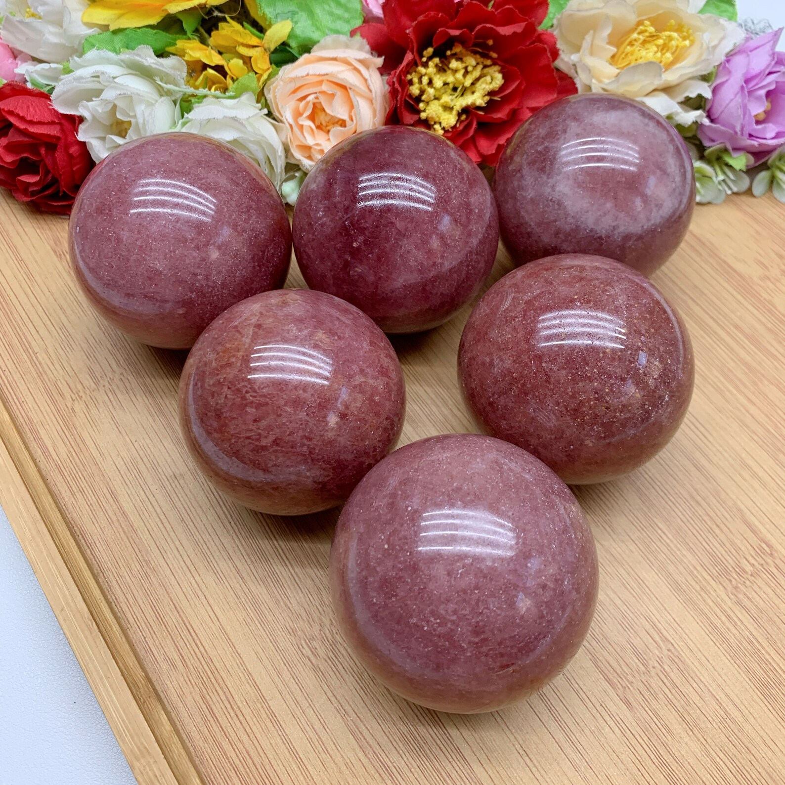 Strawberry quartz crystal sphere