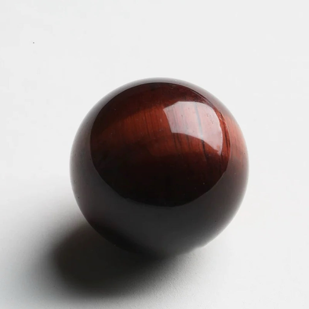 Red tiger eye stone sphere