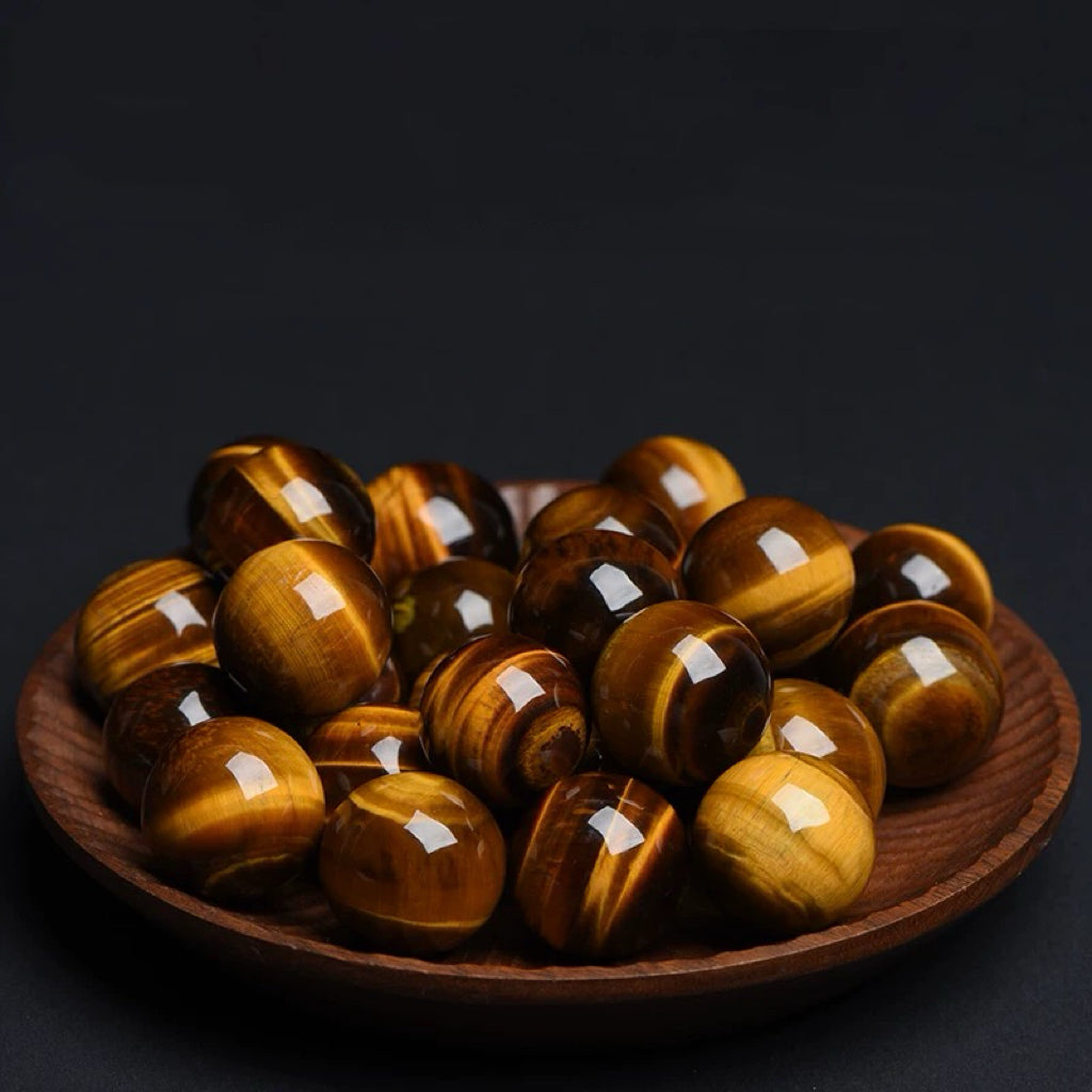 Yellow tiger eye stone sphere