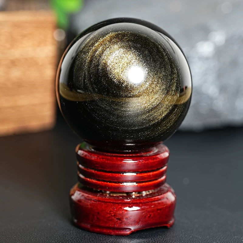 Golden-color obsidian sphere