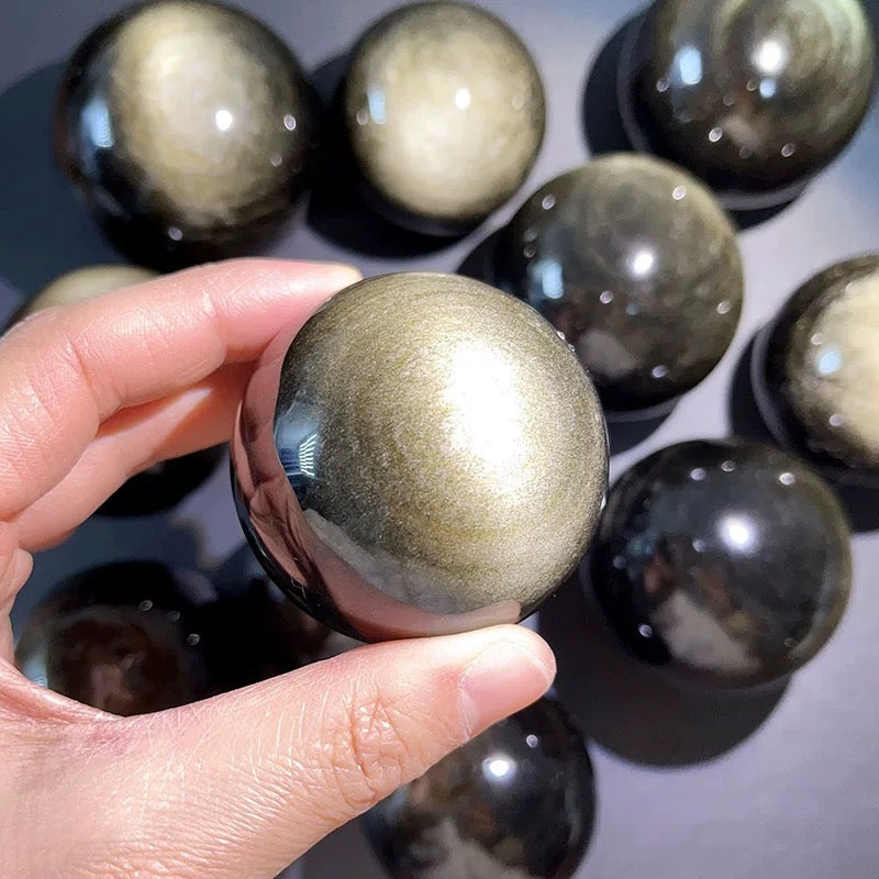 Golden-color obsidian sphere