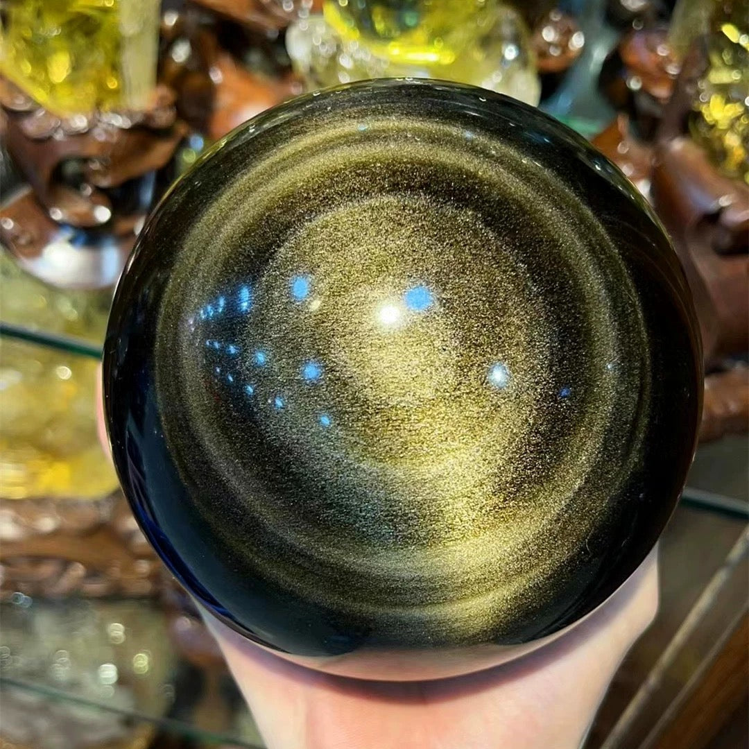 Golden-color obsidian sphere
